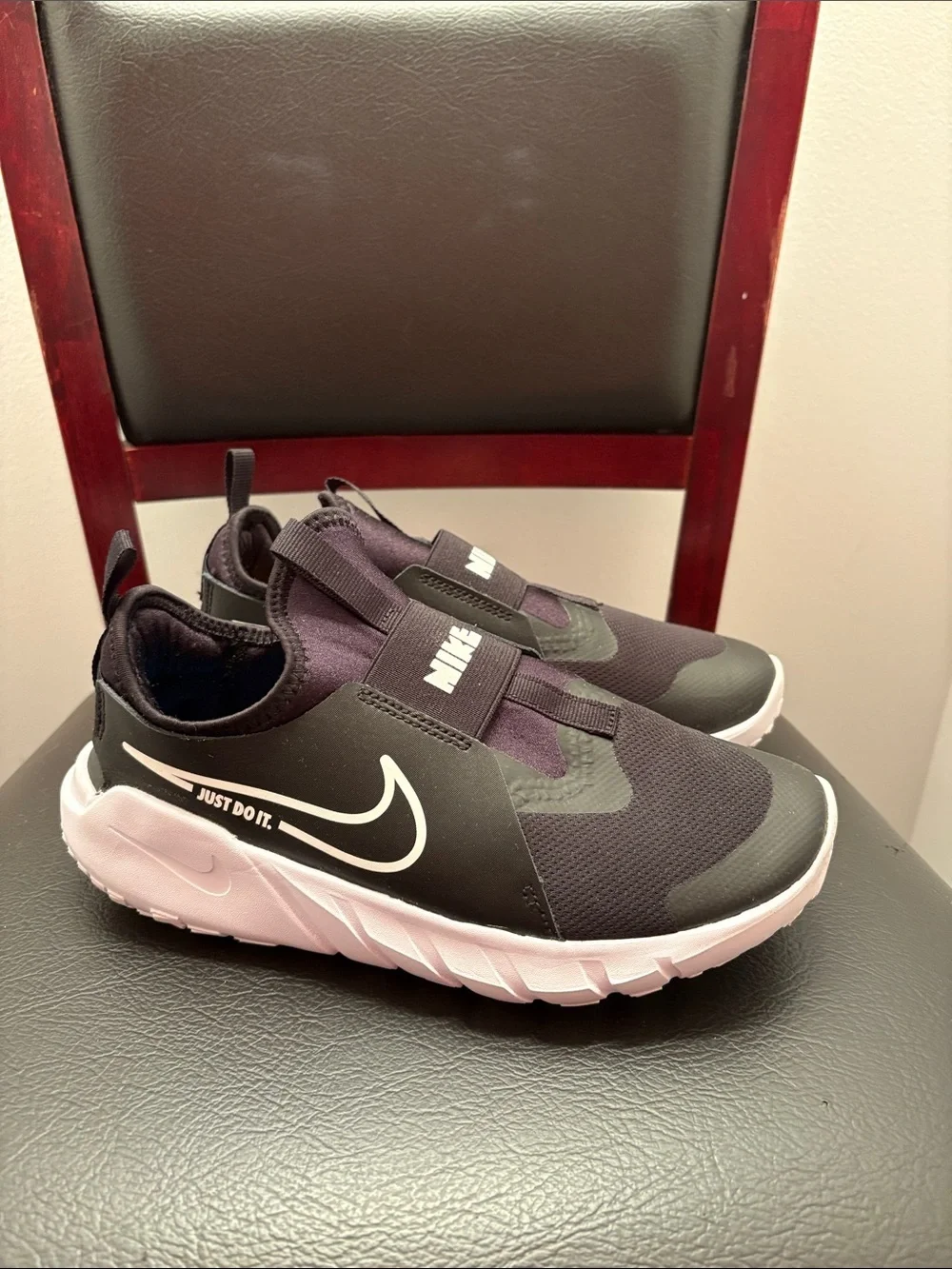 Nike Kids Black and Pink Slip-On Sneakers with White Swoosh